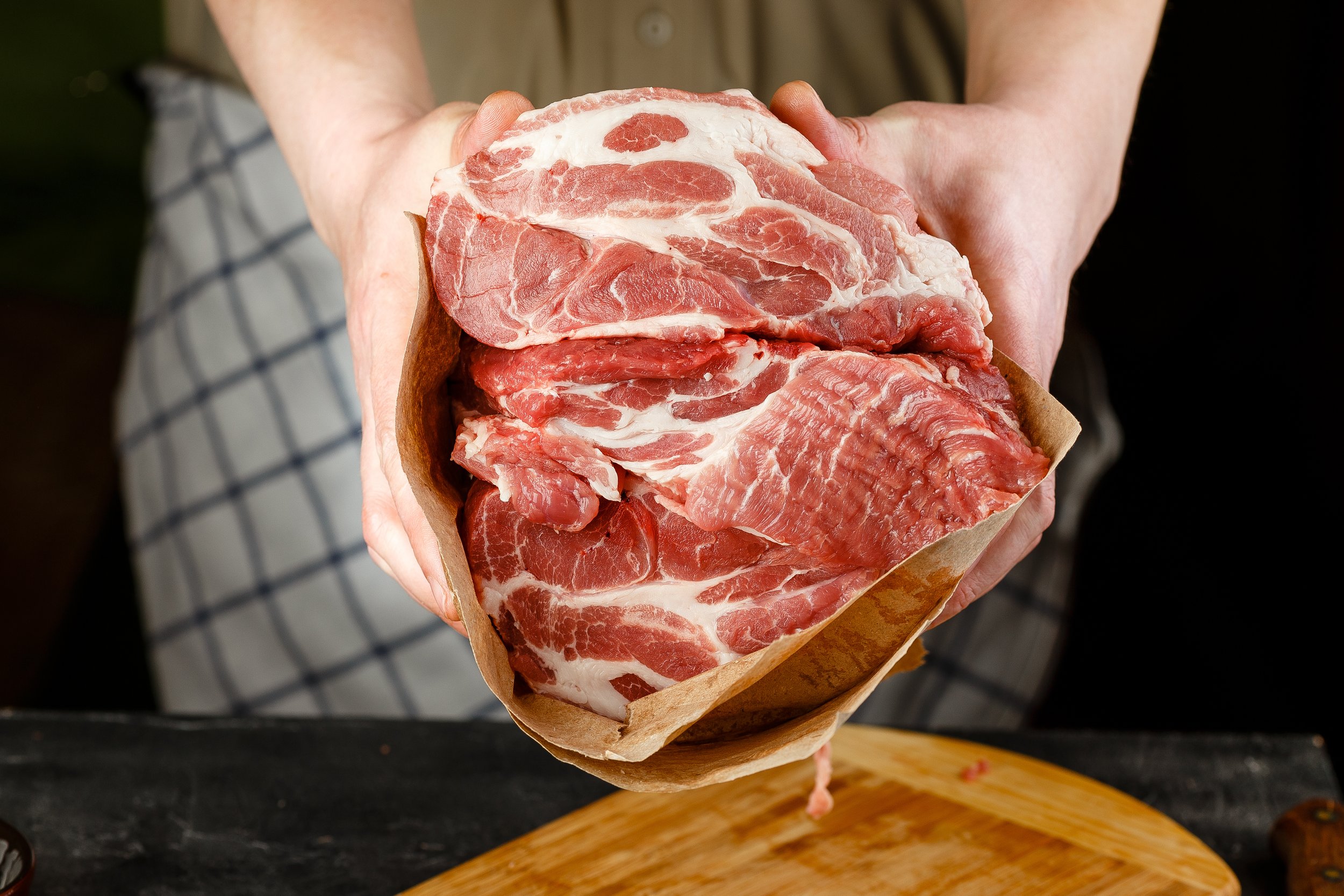 Close up of Male hands chopping knife pork Image placeholder indicating a photo is needed, typically used in web design or content management systems to signal missing visual content.